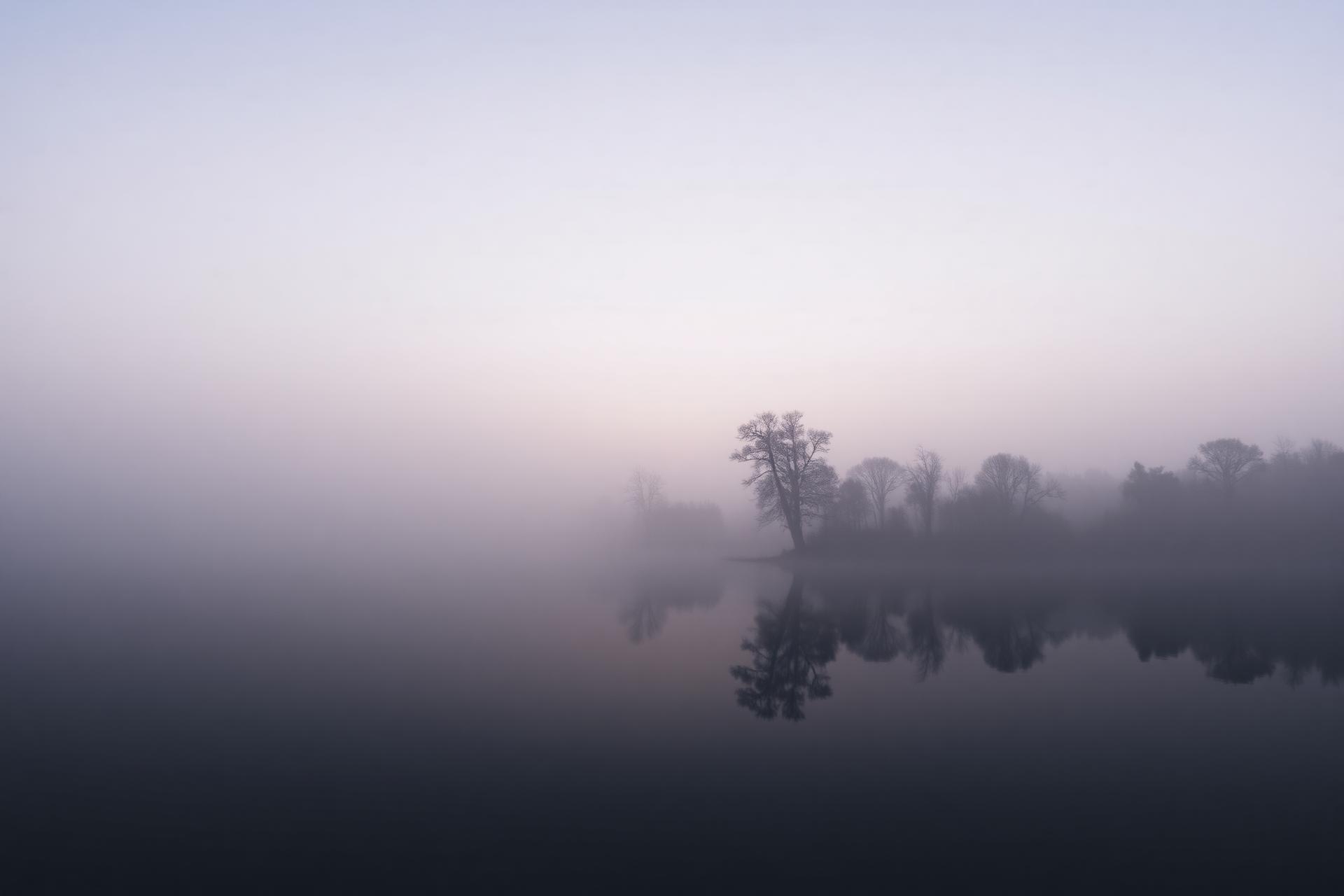 Misty lake at dawn